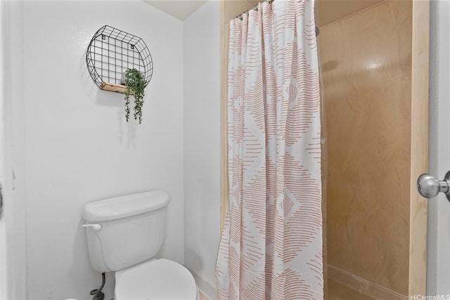 98-501 Koauka Loop Unit A704, Aiea, HI 96701 - full bathroom featuring toilet, a shower with curtain, and baseboards