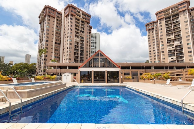 98-501 Koauka Loop Unit A704, Aiea, HI 96701 - community pool with a patio area