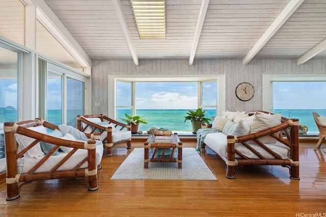 846 Mokulua Dr, Kailua, HI 96734 - living room featuring light wood-type flooring, a water view, and wooden walls