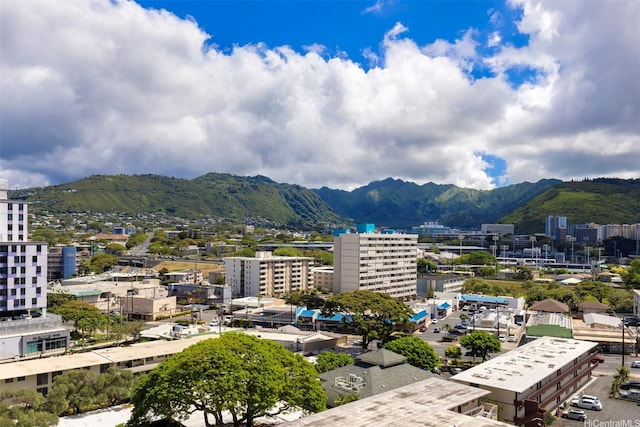 2724 Kahoaloha Ln Unit 1407, Honolulu, HI 96826 - view of mountain backdrop with nearby urban area