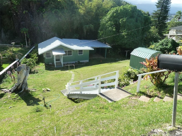 45-151 Kokokahi Pl, Kaneohe, HI 96744 - view of green lawn with an outbuilding