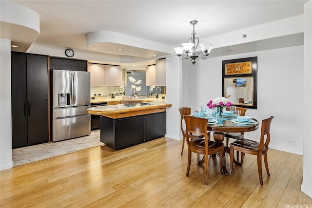 66 Queen St Unit 2904, Honolulu, HI 96813 - dining area featuring light wood finished floors, a chandelier, and recessed lighting
