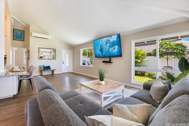 94-457 Akoa Pl, Mililani, HI 96789 - living area featuring a wall unit AC, wood finished floors, lofted ceiling, baseboards, and a textured ceiling
