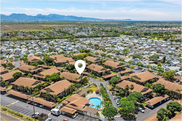 91-1040 Puamaeole St Unit 13R, Ewa Beach, HI 96706 - aerial view of residential area with mountains and a pool