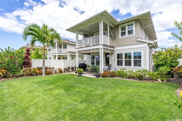 91-1158 Kai Oio St, Ewa Beach, HI 96706 - back of property featuring a balcony and a patio