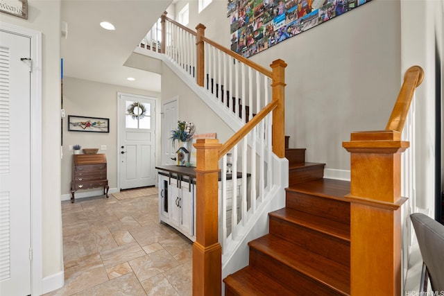 91-1158 Kai Oio St, Ewa Beach, HI 96706 - staircase with baseboards, stone finish floors, and recessed lighting