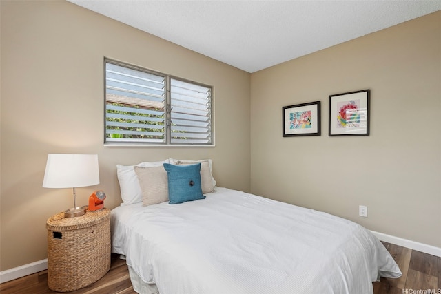 91-1338-A Karayan St, Ewa Beach, HI 96706 - bedroom with baseboards and wood finished floors