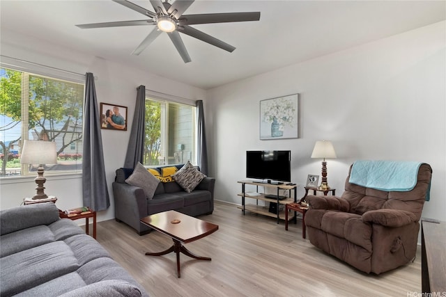 91-3524 Iwikuamoo St Unit 402, Ewa Beach, HI 96706 - living room featuring light wood finished floors and ceiling fan