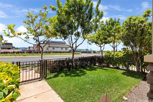 91-3524 Iwikuamoo St Unit 402, Ewa Beach, HI 96706 - view of yard with a gate