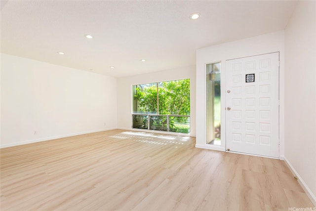 44-374 Olina St Unit 1, Kaneohe, HI 96744 - entryway featuring light wood-type flooring, recessed lighting, and baseboards
