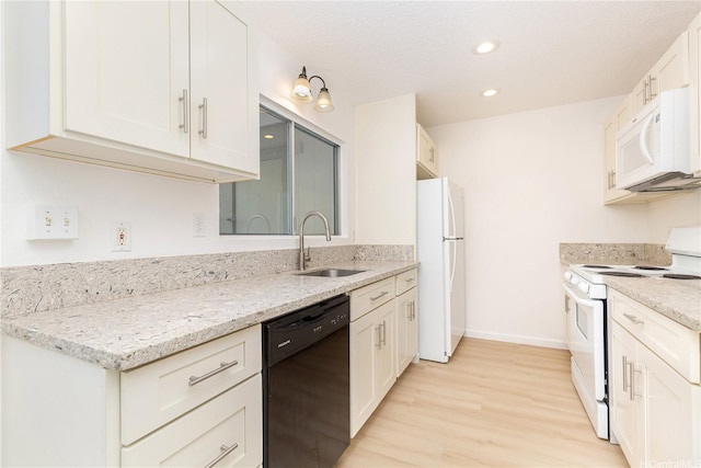44-374 Olina St Unit 1, Kaneohe, HI 96744 - kitchen featuring white appliances, a sink, light wood-style floors, recessed lighting, and white cabinets