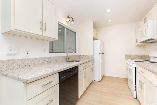 44-374 Olina St Unit 1, Kaneohe, HI 96744 - kitchen with white appliances, light wood-style flooring, recessed lighting, white cabinetry, and light stone counters