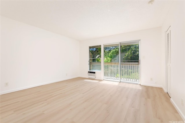 44-374 Olina St Unit 1, Kaneohe, HI 96744 - empty room featuring light wood-type flooring and baseboards