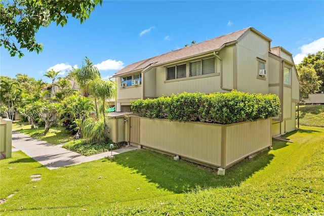44-374 Olina St Unit 1, Kaneohe, HI 96744 - rear view of property with a yard