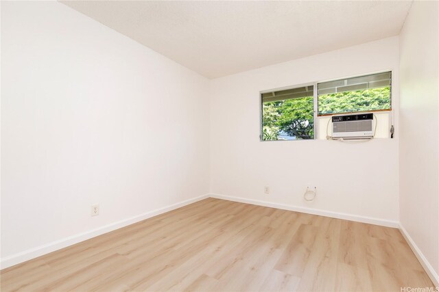 44-374 Olina St Unit 1, Kaneohe, HI 96744 - spare room with wood finished floors and baseboards