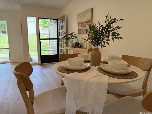 44-374 Olina St Unit 1, Kaneohe, HI 96744 - dining space featuring wood finished floors
