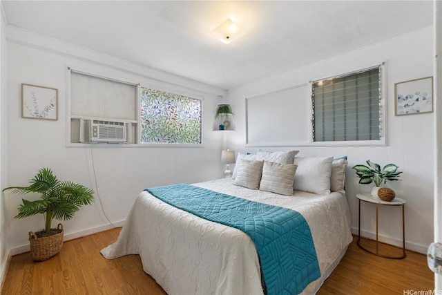 87-217 Maia St, Waianae, HI 96792 - bedroom with wood finished floors and cooling unit