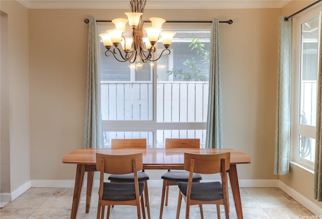 91-1019 Opuku St Unit B, Kapolei, HI 96707 - dining area with ornamental molding, baseboards, and a chandelier