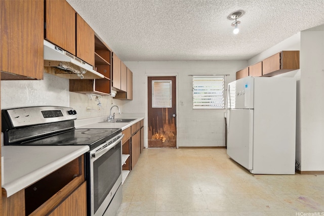 94-533 Ulieo St, Waipahu, HI 96797 - kitchen with freestanding refrigerator, stainless steel electric range oven, under cabinet range hood, open shelves, and a textured ceiling