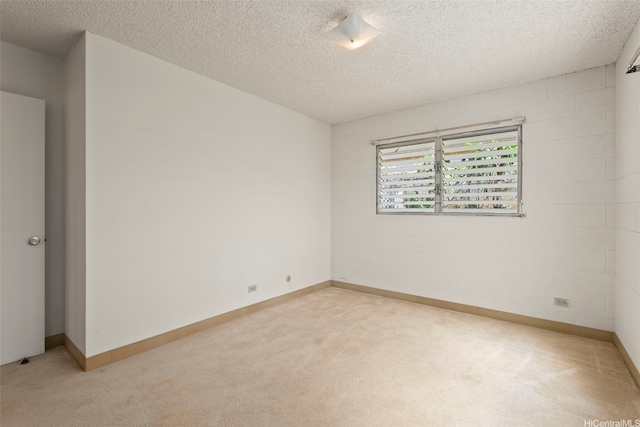 94-533 Ulieo St, Waipahu, HI 96797 - unfurnished room with light carpet, a textured ceiling, and baseboards