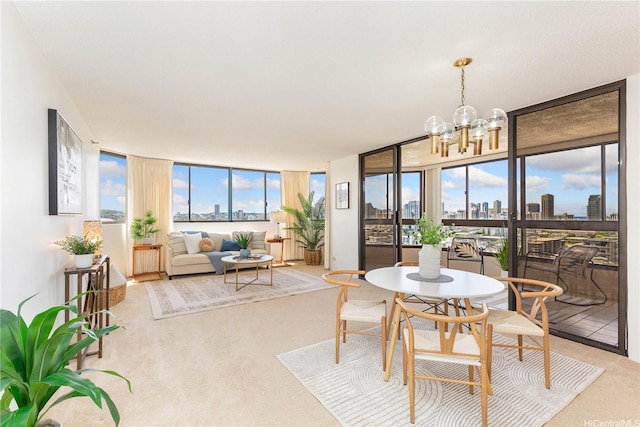 1760 S Beretania St Unit 15B, Honolulu, HI 96826 - dining room featuring a wall of windows, carpet, a chandelier, plenty of natural light, and a skyline view