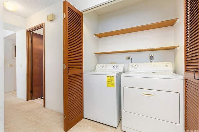 1760 S Beretania St Unit 15B, Honolulu, HI 96826 - washroom with separate washer and dryer and light carpet