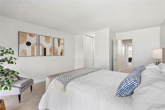 500 University Ave Unit 532, Honolulu, HI 96826 - carpeted bedroom featuring baseboards and a textured ceiling