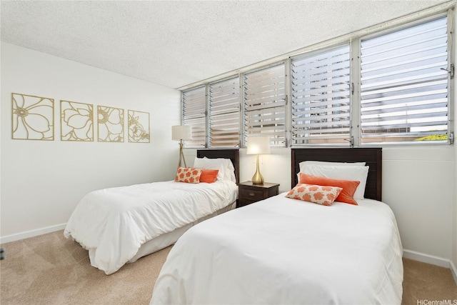 500 University Ave Unit 532, Honolulu, HI 96826 - bedroom with carpet flooring, baseboards, and a textured ceiling