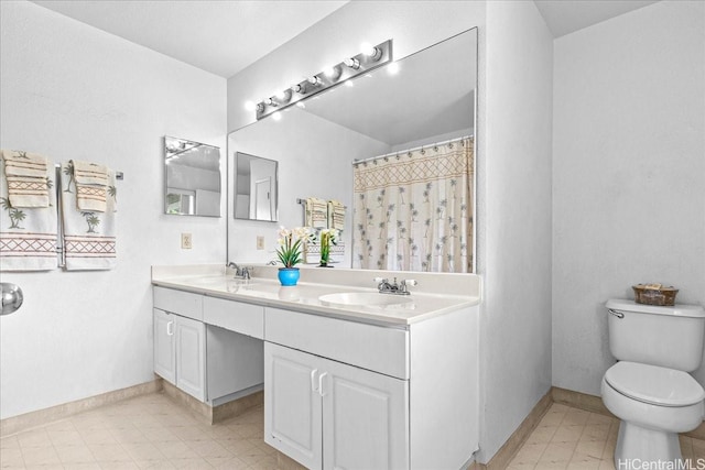 94-816 Lumiauau St Unit Ff101, Waipahu, HI 96797 - full bath with double vanity, toilet, baseboards, and tile patterned floors