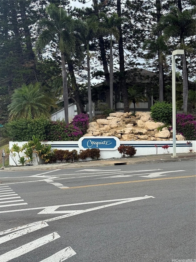 255 Mananai Pl Unit 52T, Honolulu, HI 96818 - view of asphalt road with curbs and sidewalks