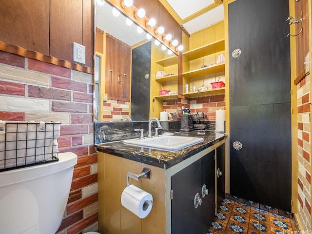 509 Lawelawe St, Honolulu, HI 96821 - half bathroom featuring toilet, vanity, and tile patterned floors