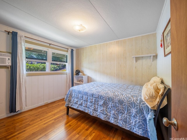 509 Lawelawe St, Honolulu, HI 96821 - bedroom with wood-type flooring and wood walls