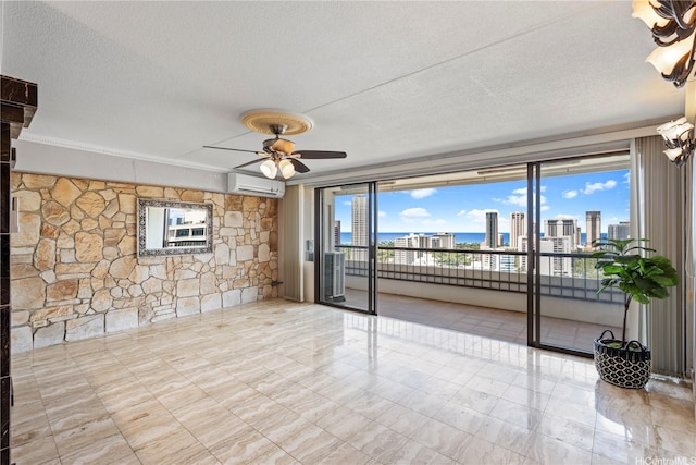 2333 Kapiolani Blvd Unit 2211, Honolulu, HI 96826 - empty room with a textured ceiling, a skyline view, ceiling fan, and a wall unit AC