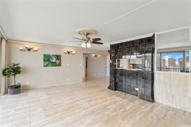 2333 Kapiolani Blvd Unit 2211, Honolulu, HI 96826 - unfurnished living room with a textured ceiling, ornamental molding, a ceiling fan, a chandelier, and baseboards