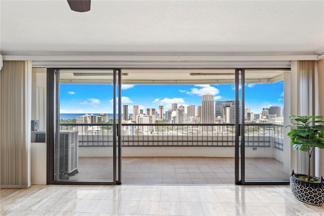 2333 Kapiolani Blvd Unit 2211, Honolulu, HI 96826 - spare room with a view of skyline and a textured ceiling