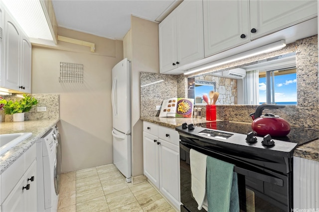 2333 Kapiolani Blvd Unit 2211, Honolulu, HI 96826 - kitchen featuring freestanding refrigerator, black / electric stove, decorative backsplash, white cabinetry, and dishwasher