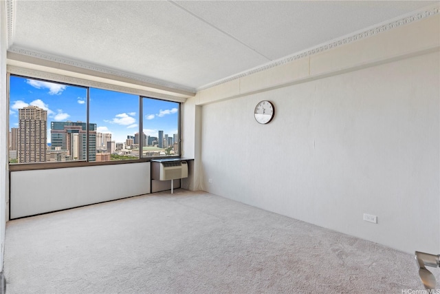 2333 Kapiolani Blvd Unit 2211, Honolulu, HI 96826 - carpeted empty room with a skyline view, a textured ceiling, and a wall unit AC