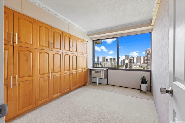 2333 Kapiolani Blvd Unit 2211, Honolulu, HI 96826 - unfurnished bedroom with a skyline view, light carpet, a textured ceiling, and ornamental molding