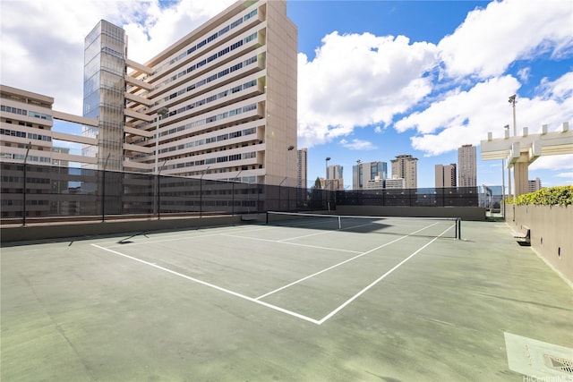 2333 Kapiolani Blvd Unit 2211, Honolulu, HI 96826 - view of tennis court with a skyline view