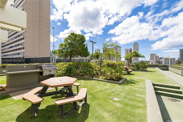 2333 Kapiolani Blvd Unit 2211, Honolulu, HI 96826 - view of community featuring a city view and a lawn