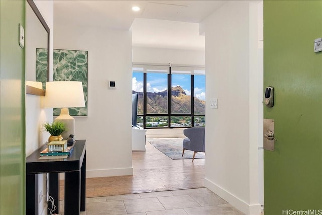 229 Paoakalani Ave Unit Ph-3807, Honolulu, HI 96815 - hall featuring tile patterned floors, a mountain view, and recessed lighting