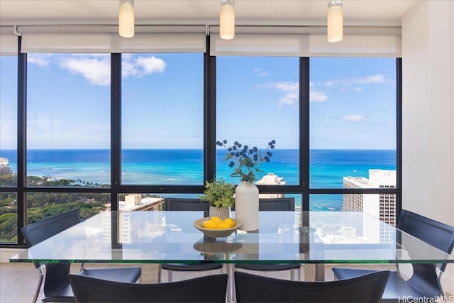 229 Paoakalani Ave Unit Ph-3807, Honolulu, HI 96815 - dining room with a water view and a wall of windows