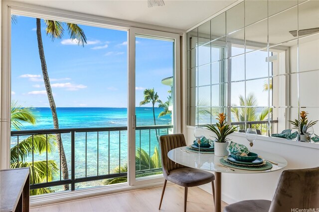 2943 Kalakaua Ave Unit 606, Honolulu, HI 96815 - sunroom / solarium featuring a water view