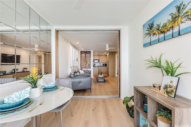 2943 Kalakaua Ave Unit 606, Honolulu, HI 96815 - dining room featuring wood finished floors and a ceiling fan