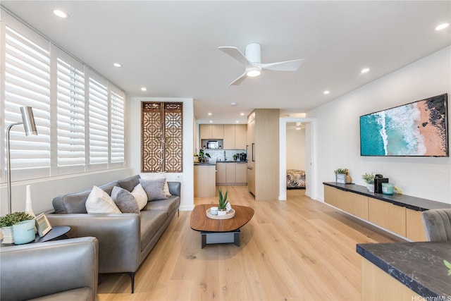 2943 Kalakaua Ave Unit 606, Honolulu, HI 96815 - living room featuring light wood-type flooring, ceiling fan, and recessed lighting