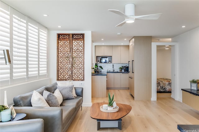 2943 Kalakaua Ave Unit 606, Honolulu, HI 96815 - living room featuring light wood-style flooring, ceiling fan, and recessed lighting