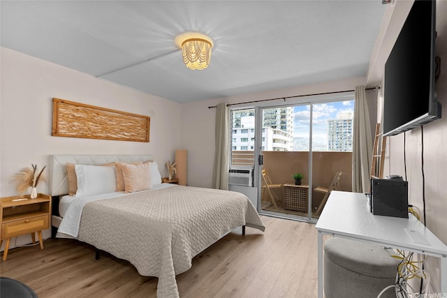 2450 Prince Edward St Unit 1006A, Honolulu, HI 96815 - bedroom with light wood finished floors and access to outside