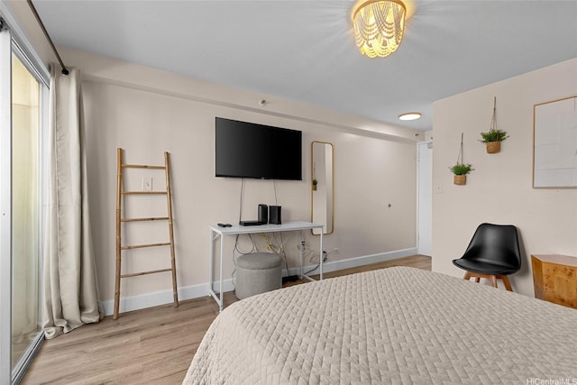 2450 Prince Edward St Unit 1006A, Honolulu, HI 96815 - bedroom featuring wood finished floors and baseboards