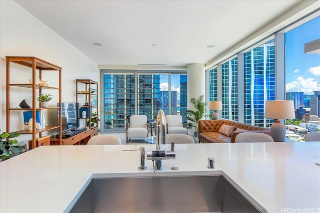 1118 Ala Moana Blvd Unit 2505, Honolulu, HI 96814 - kitchen with a sink, floor to ceiling windows, and a view of city