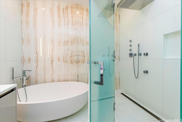1118 Ala Moana Blvd Unit 2505, Honolulu, HI 96814 - bathroom with walk in shower, vanity, and a soaking tub